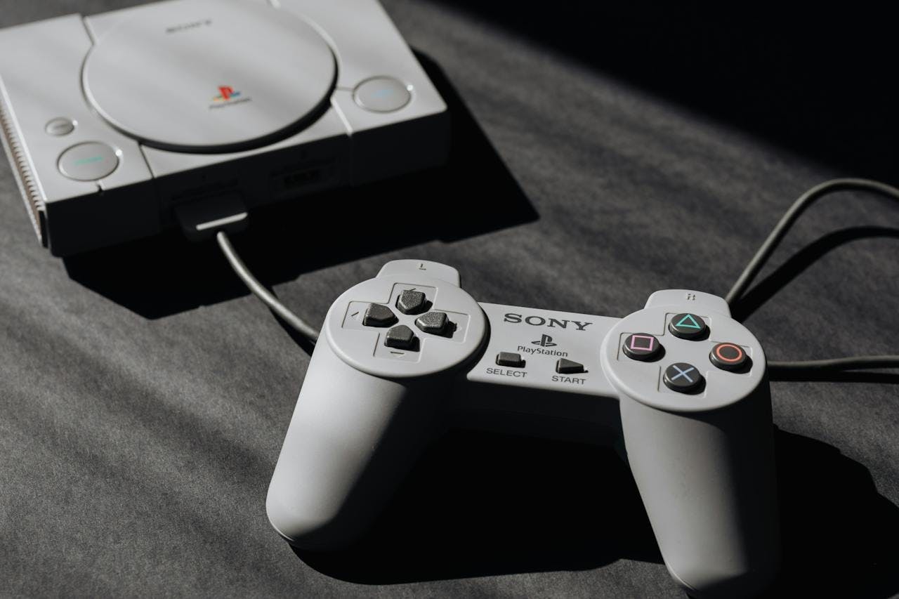 Photo by Karolina Grabowska: https://www.pexels.com/photo/photo-of-play-station-game-console-and-remote-controller-4219883/